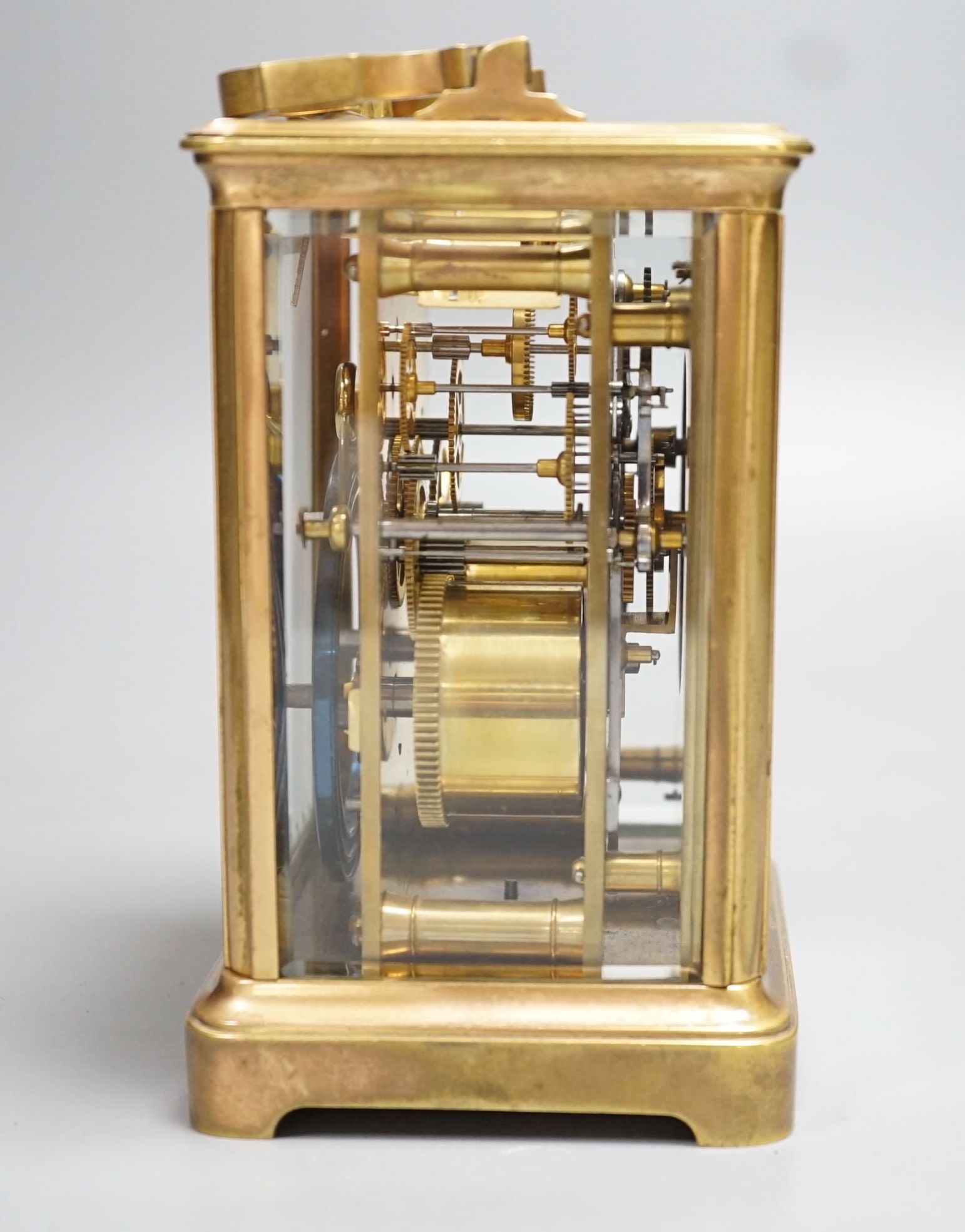 A French brass carriage clock, retailed by Drew and Sons, 166 Leadenhall Street London. 14.5cm (handle down)